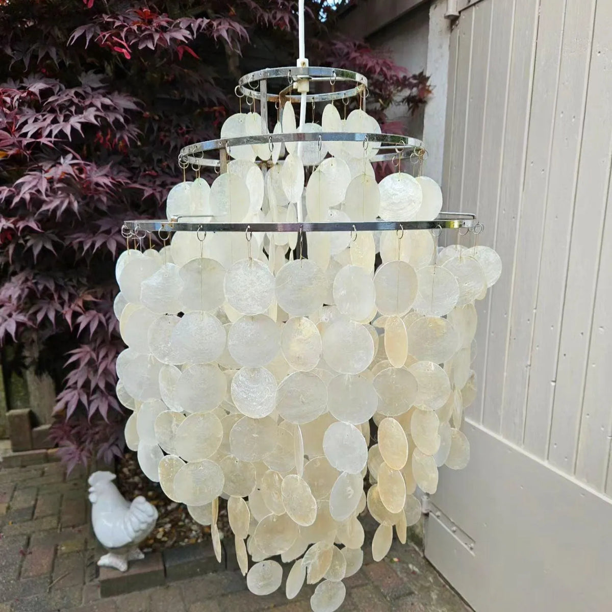 Seashell Pendant Light with Layered Natural Shell Design and Sculptural Iron Frame