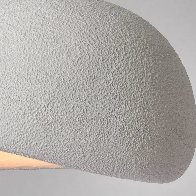 Suspension au design sculptural de nuage et à l’éclairage doux et diffus