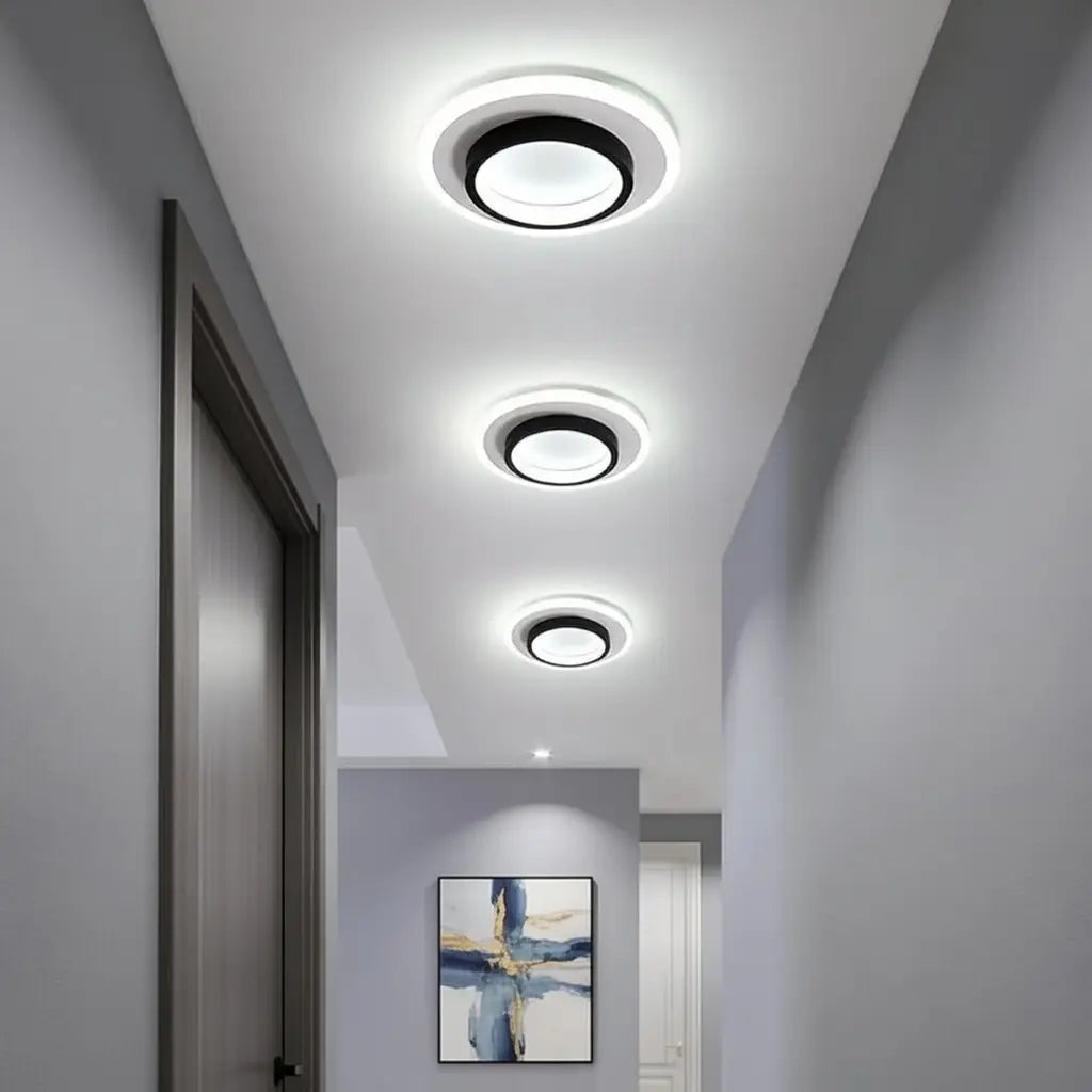 Plafoniera LED a conchiglia con anello luminoso e illuminazione a doppio strato, aderente al soffitto