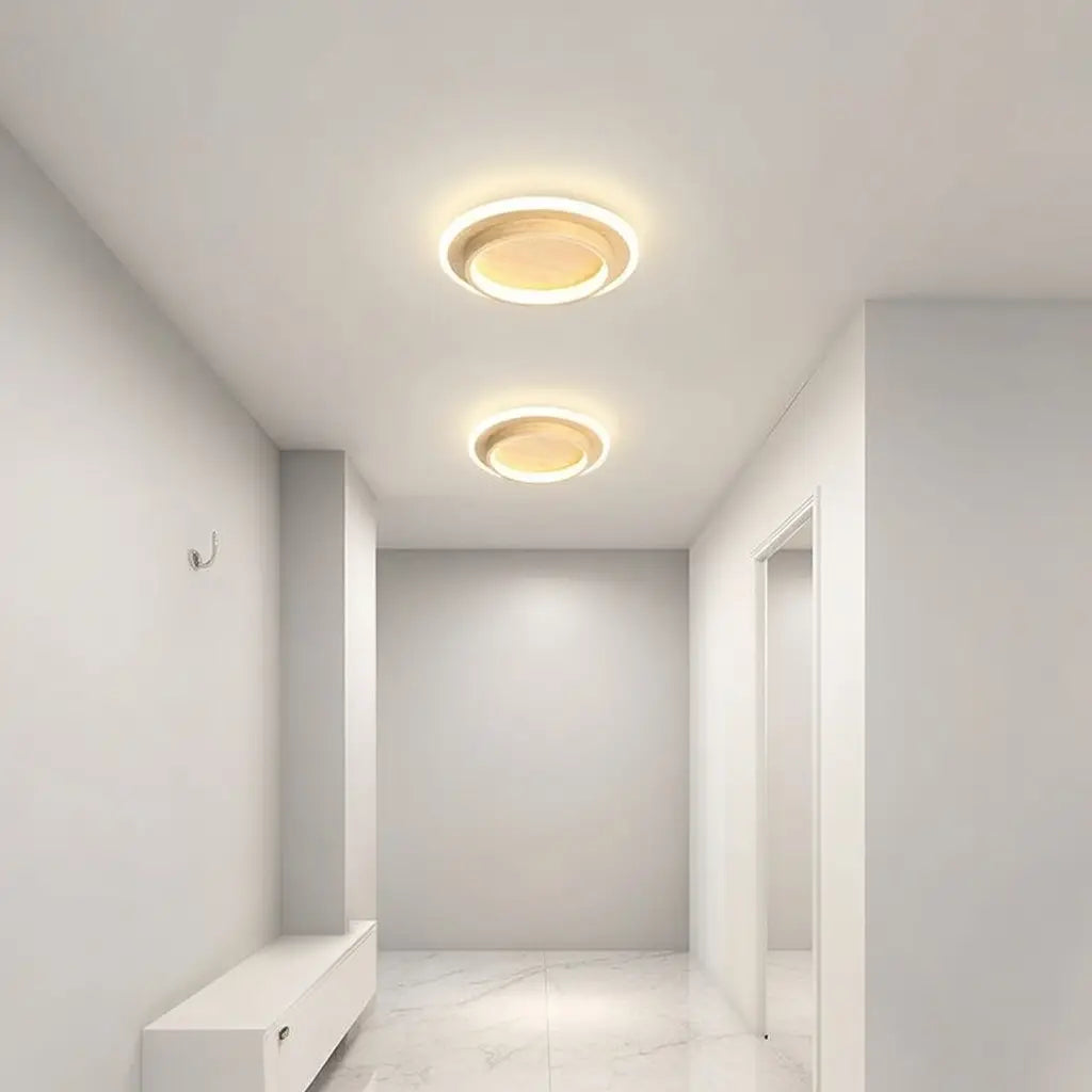 Plafoniera LED a conchiglia con anello luminoso e illuminazione a doppio strato, aderente al soffitto