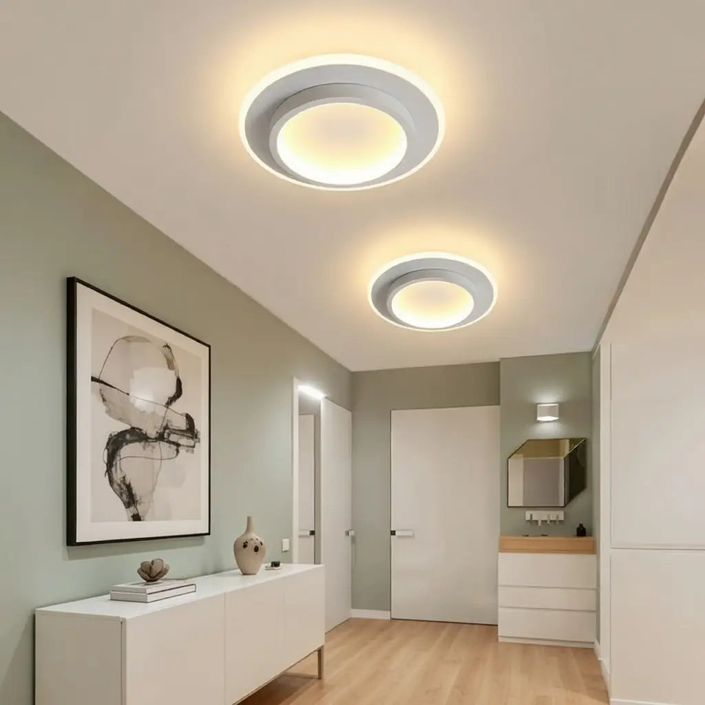 Plafoniera LED a conchiglia con anello luminoso e illuminazione a doppio strato, aderente al soffitto