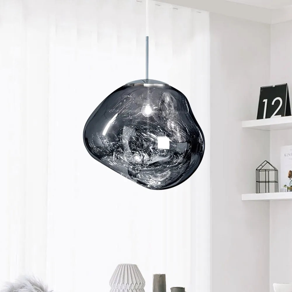 Lampada a sospensione dal design moderno con paralume scolpito in policarbonato a effetto fuso e LED