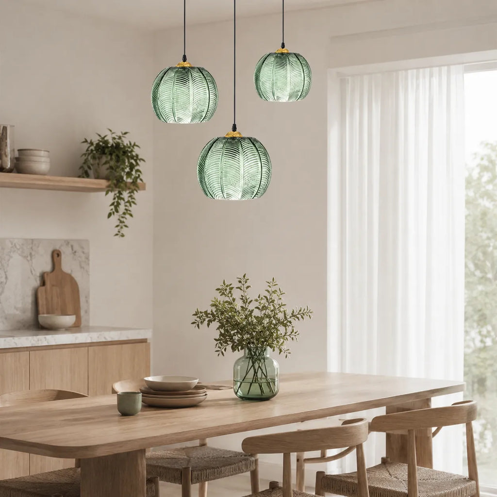 Pendant Light with Leaf-Pattern Glass and Soft Ambient Illumination