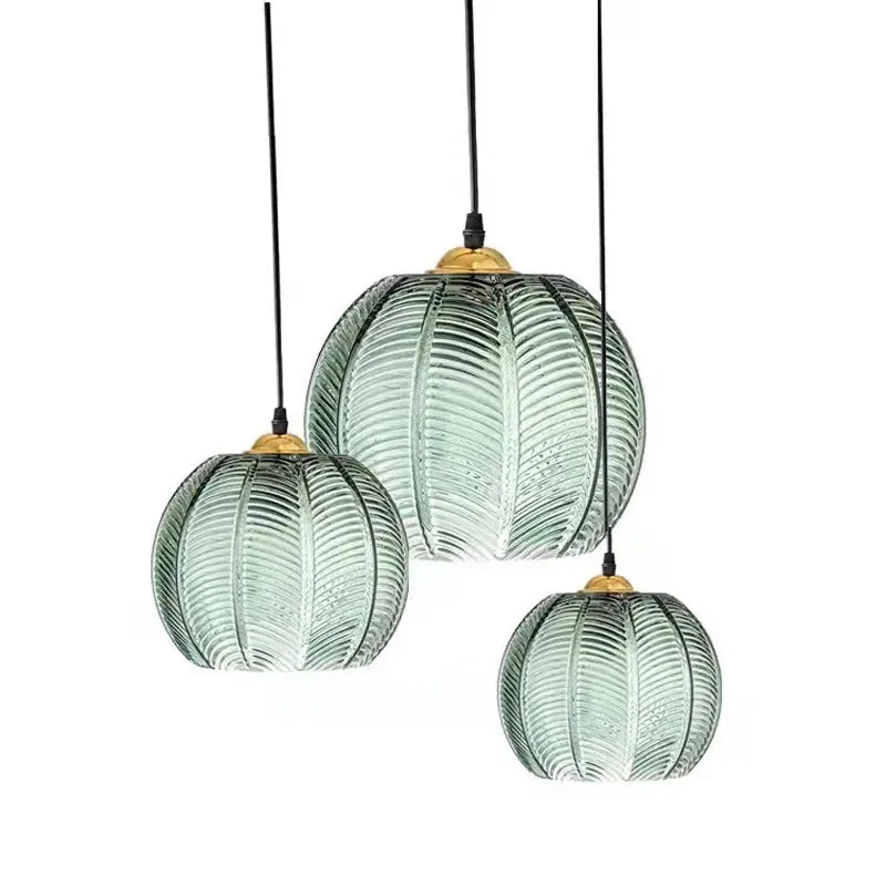 Pendant Light with Leaf-Pattern Glass and Soft Ambient Illumination