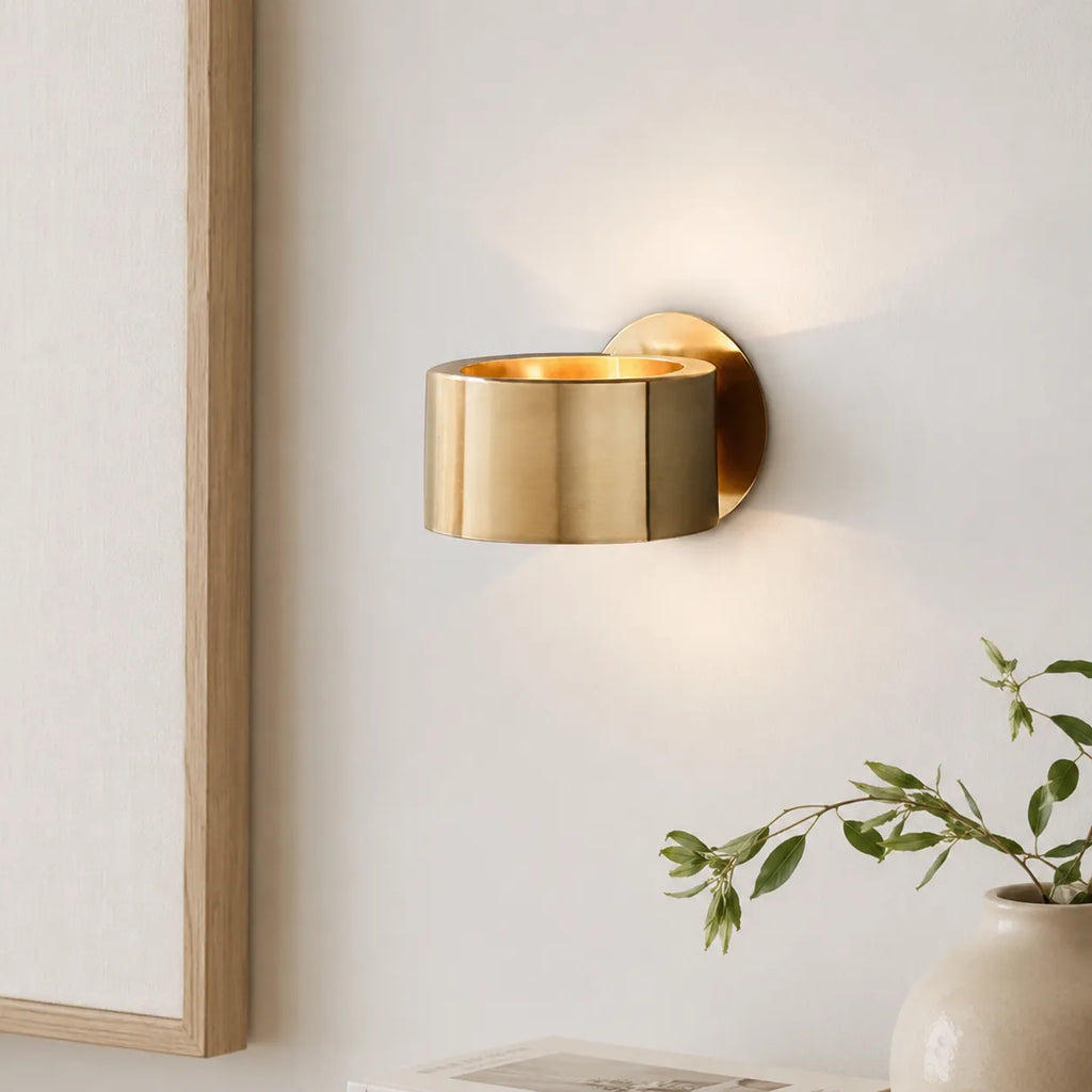 Wall Sconce Lamp with Mid Century Modern Gold Ring Design and Sculptural Circular Profile