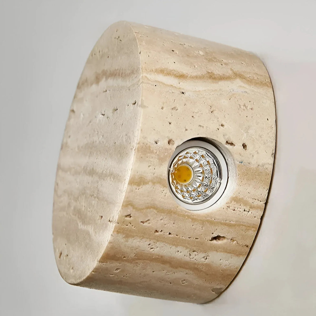Travertine Minimalist Wall Light with Soft Downlight and Rounded Stone Form