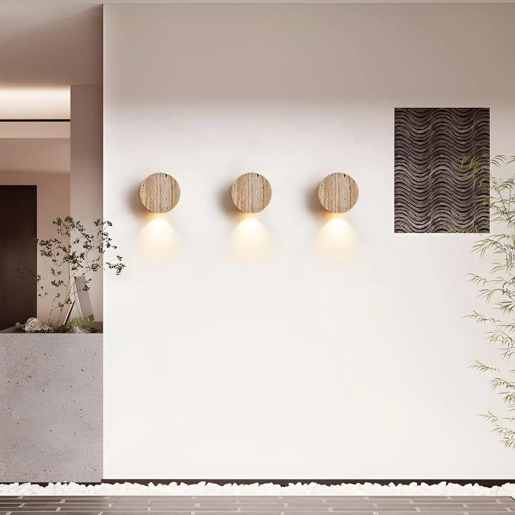 Travertine Minimalist Wall Light with Soft Downlight and Rounded Stone Form