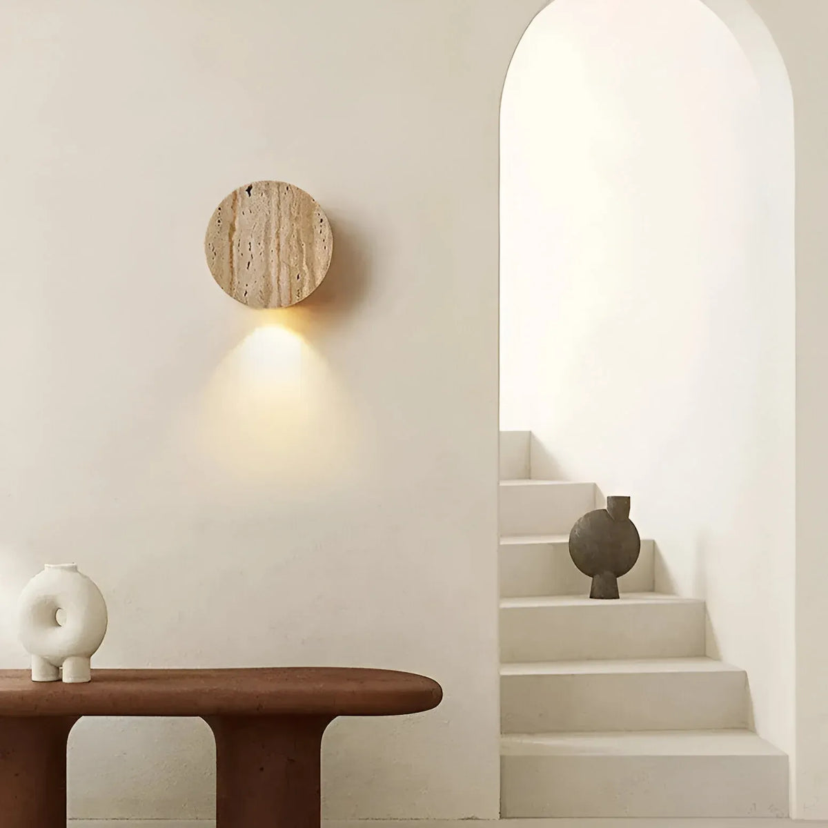 Travertine Minimalist Wall Light with Soft Downlight and Rounded Stone Form
