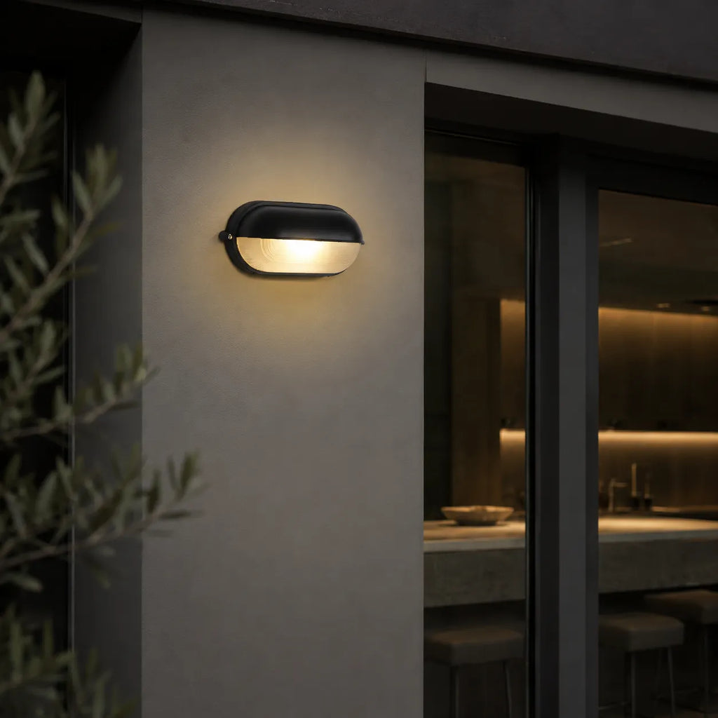 Outdoor Wall Sconce with Ribbed Glass Diffuser and Die-Cast Aluminium Industrial Bulkhead Design