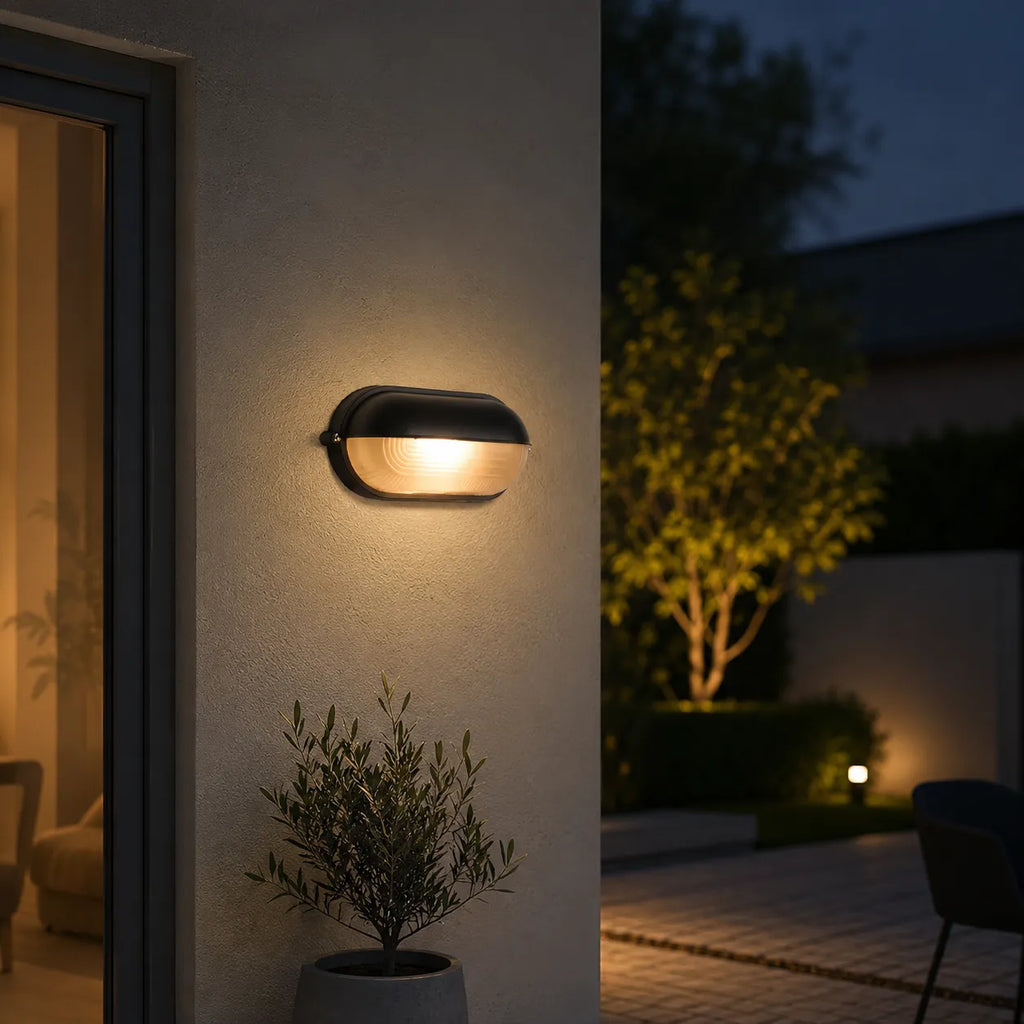 Outdoor Wall Sconce with Ribbed Glass Diffuser and Die-Cast Aluminium Industrial Bulkhead Design