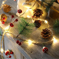 Battery Operated Christmas Garland Lights with Warm White LED and Pine Cones - Image 1